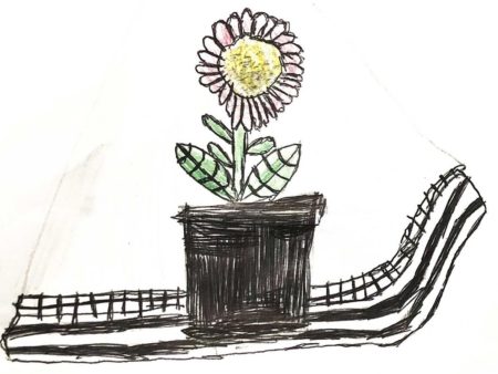 A child's drawing of a flower in a plant pot on some train tracks
