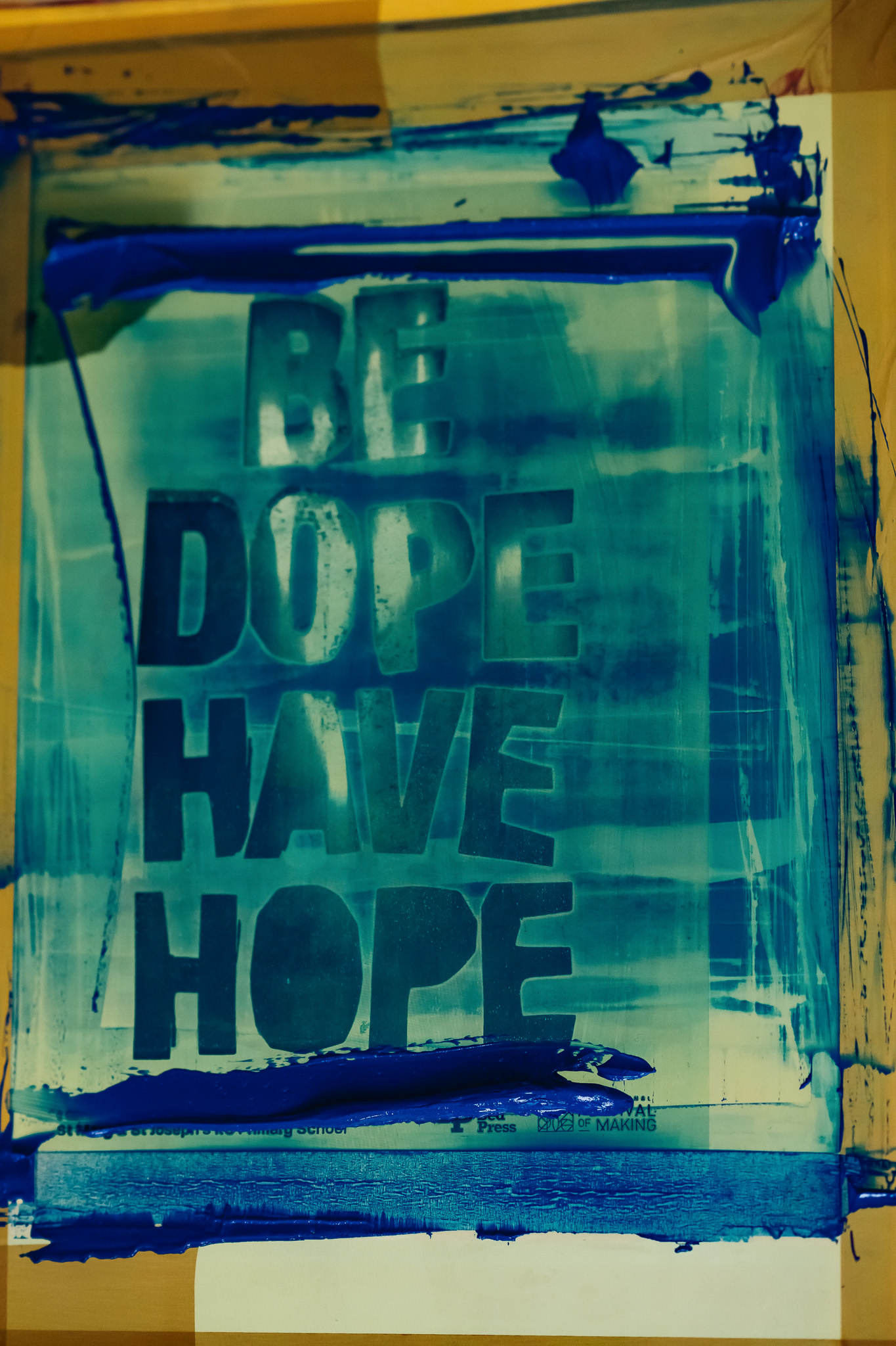 A screen printed screen reading 'Be dope, have hope.'